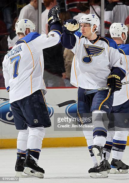 Erik Johnson and Keith Tkachuk of the St. Louis Blues celebrate after defeating the New Jersey Devils at the Prudential Center on March 20, 2010 in...