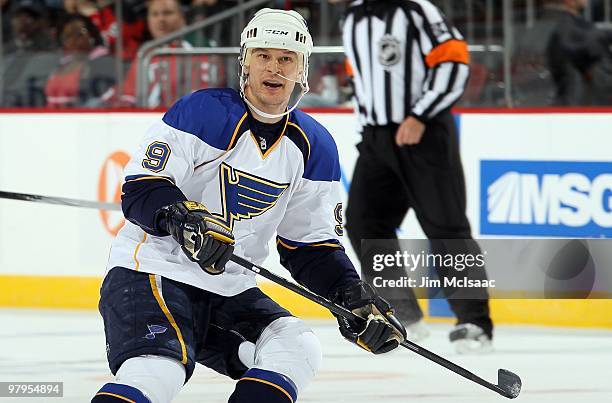 Paul Kariya of the St. Louis Blues skates against the New Jersey Devils at the Prudential Center on March 20, 2010 in Newark, New Jersey. The Blues...