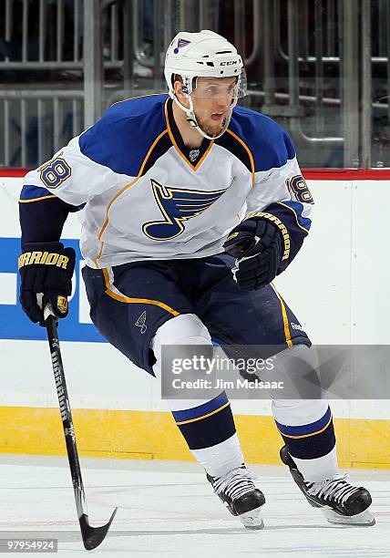 Jay McClement of the St. Louis Blues skates against the New Jersey Devils at the Prudential Center on March 20, 2010 in Newark, New Jersey. The Blues...