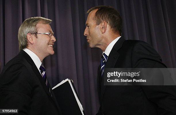 Australian Prime Minister Kevin Rudd and Australia's opposition leader Tony Abbott shake hands after their debate at the National Press Club on March...