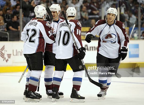 Chris Stewart of the Colorado Avalanche celebrates his goal with his teammates for a 1-0 lead over the Los Angeles Kings on March 22, 2010 at the the...