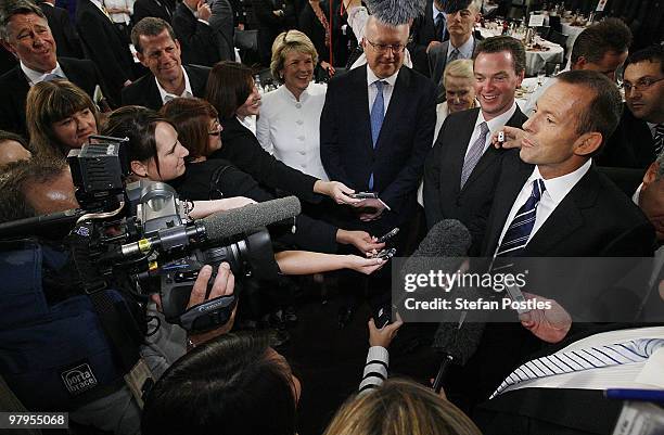 Australia's opposition leader Tony Abbott speaks to the media after a debate against Prime Minister Kevin Rudd at the National Press Club on March...