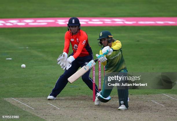 Sarah Taylor of England looks on as Mignon Du Preez of South Africa scores runs during the International T20 Tri-Series match between England Women...