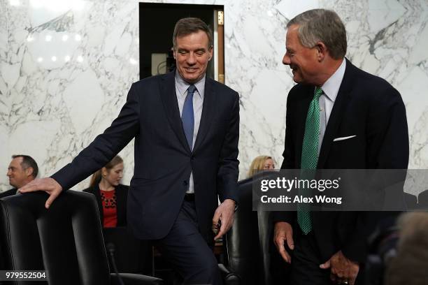 Senate Intelligence Committee Chairman Sen. Richard Burr and Vice Chairman Sen. Mark Warner arrive at a hearing before the committee June 20, 2018 on...