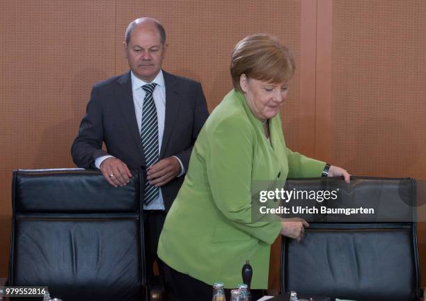 Meeting of the Federal Cabinet in the Federal Chancellery in Berlin. Angela Merkel, Federal Chacellor , and Olaf Scholz, Federal Minister of Justce,...