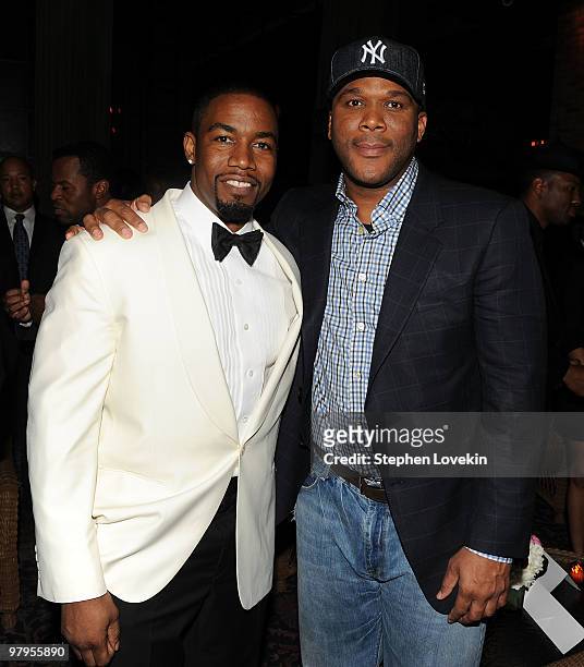Actor Michael Jai White and director Tyler Perry attend the "Why Did I Get Married Too?" after party on March 22, 2010 in New York City.