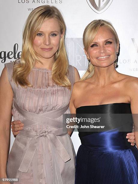 Actresses Kristen Bell and Kristin Chenoweth arrive at the "Backstage at the Geffen" gala at Geffen Playhouse on March 22, 2010 in Los Angeles,...