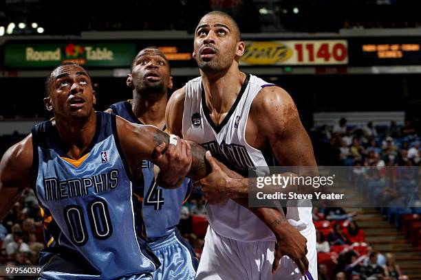 Ime Udoka of the Sacramento Kings looks to get a rebound over Darrell Arthur of the Memphis Grizzlies on March 22, 2010 at ARCO Arena in Sacramento,...