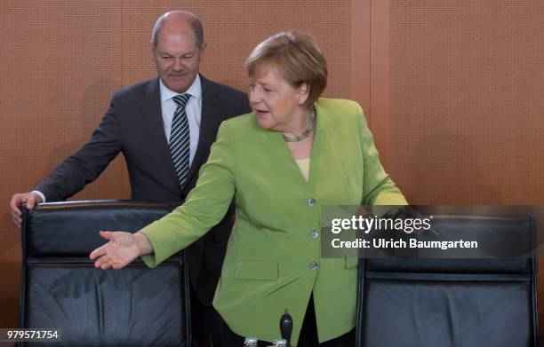 Meeting of the Federal Cabinet in the Federal Chancellery in Berlin. Angela Merkel, Federal Chacellor , and Olaf Scholz, Federal Minister of Justce,...