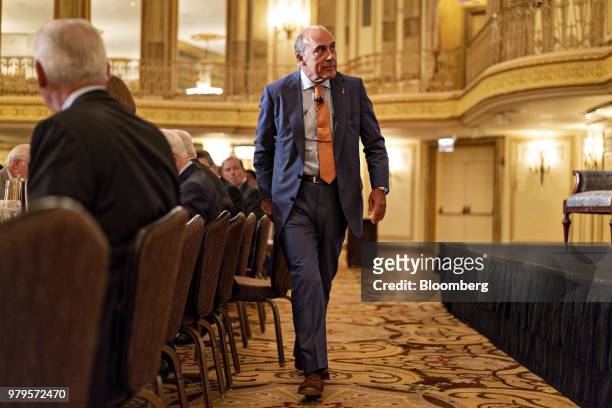 Muhtar Kent, chairman of the Coca-Cola Co., arrives to speak during an Executives Club Of Chicago luncheon in Chicago, Illinois, U.S., on Wednesday,...