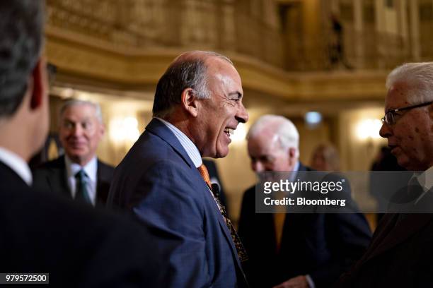 Muhtar Kent, chairman of the Coca-Cola Co., greets attendees after speaking at an Executives Club Of Chicago luncheon in Chicago, Illinois, U.S., on...