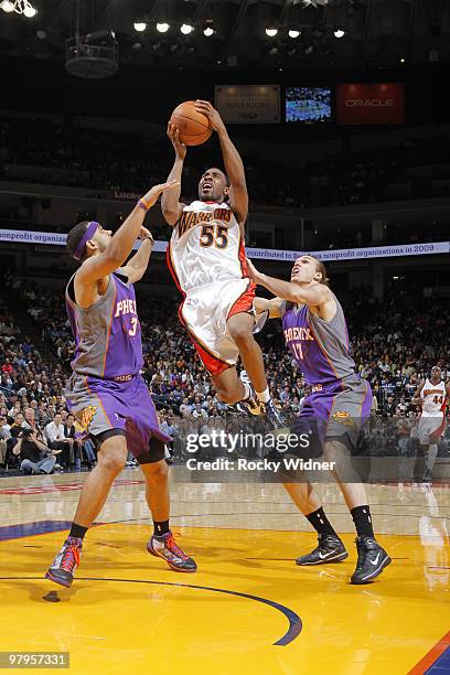 Reggie Williams of the Golden State Warriors scores in traffic against the Phoenix Suns on March 22, 2010 at Oracle Arena in Oakland, California....