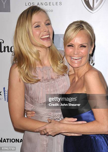 Actresses Kristen Bell and Kristin Chenoweth arrive at the "Backstage at the Geffen" gala at Geffen Playhouse on March 22, 2010 in Los Angeles,...