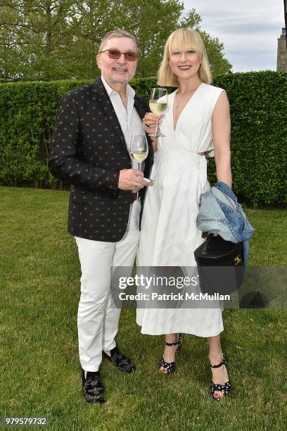 Gary Flom and Svitlana Flom attend The 18th Annual Midsummer Night Drinks Benefiting God's Love We Deliver at Private Residence on June 9, 2018 in...