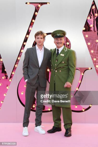 Luke Newberry poses with the Harrods Green Man at the Summer Party at the V&A in partnership with Harrods at the Victoria and Albert Museum on June...