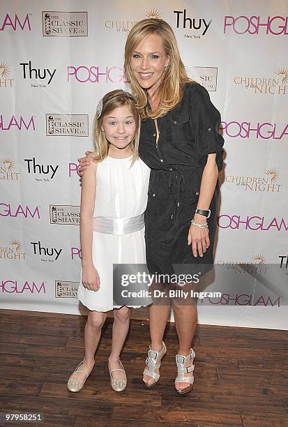 Actress Julie Benz and actress Julia Springer attend the POSHGLAM.COM to benefit children of the night at the Celebrity Vault on March 22, 2010 in...