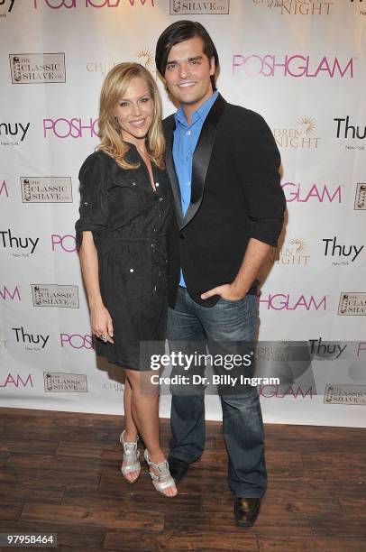 Actress Julie Benz and actor Ben Decker attend the POSHGLAM.COM to benefit children of the night at the Celebrity Vault on March 22, 2010 in Beverly...