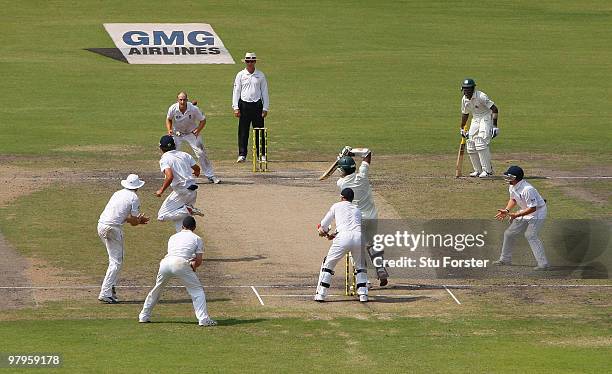 England captain Alastair Cook deflects a ball hit by Bangladesh batsman Junaid Siddique to be caught by bowler James Tredwell during day four of the...