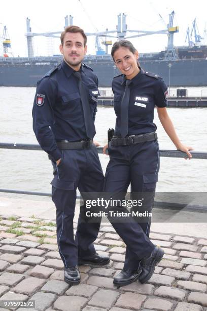 Marc Barthel and Aybi Era during the on set photo call of 'Notruf Hafenkante' at Fischauktionshalle on June 20, 2018 in Hamburg, Germany.