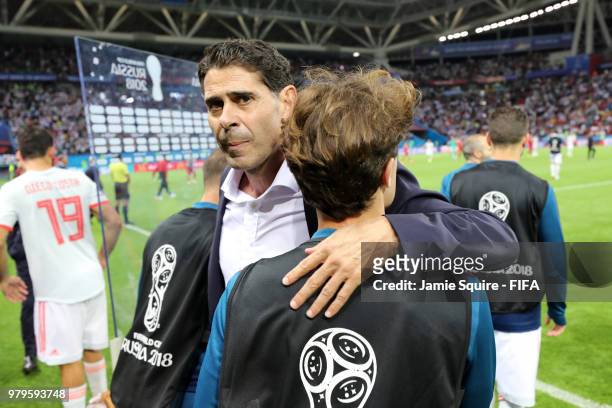 Fernando Hierro, Head coach of Spain celebrates with Alvaro Odriozola of Spain following their sides victory in the 2018 FIFA World Cup Russia group...