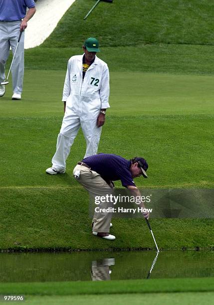 Tom Watson of the USA in the water on the 11th hole during the first day of the 2001 Masters at the Augusta National Golf Club, Augusta, GA,...