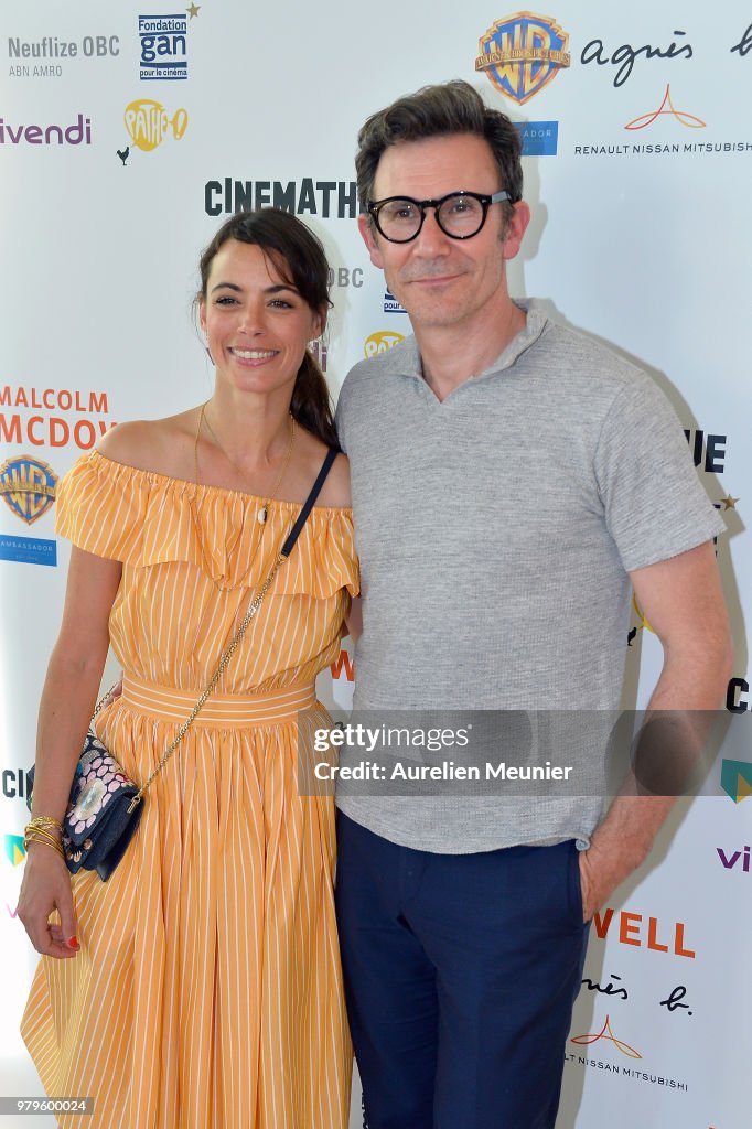 Berenice Bejo and Michel Hazanavicius attend the "Malcolm McDowell