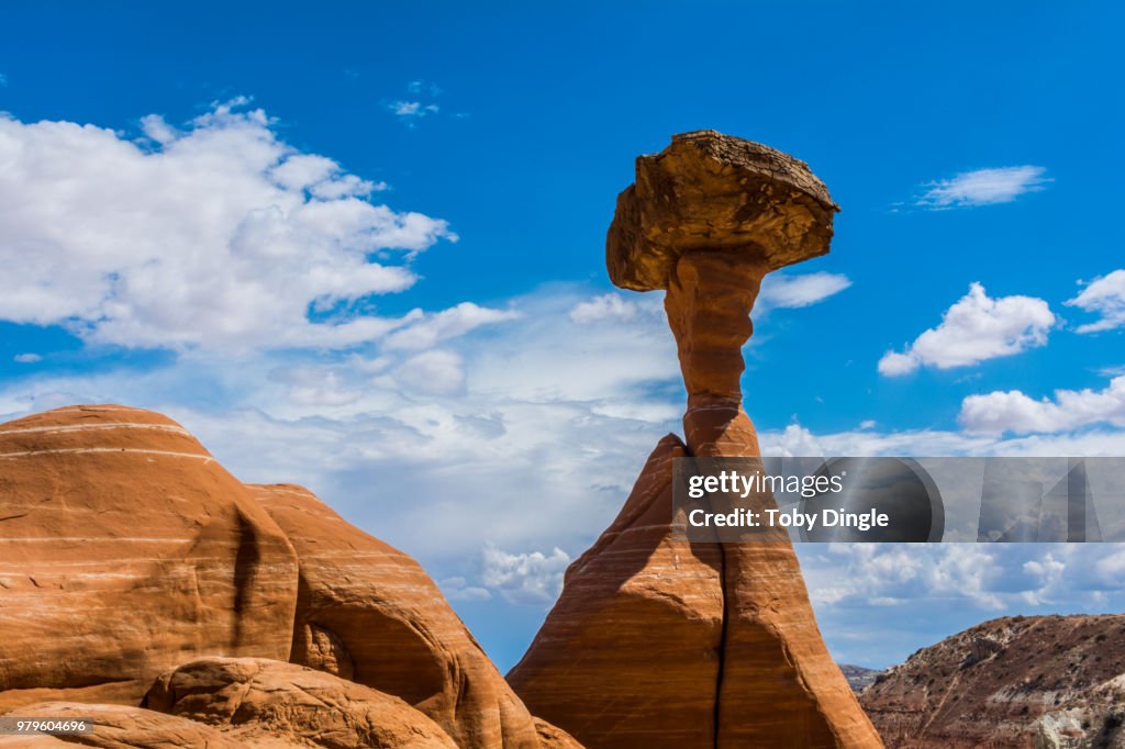 Mushroom-shaped hoodoo rock formation on sunny day, Kanab, Utah, USA