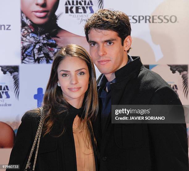 Brazilian Real Madrid's football player Kaka and his wife Caroline Celico pose before a showcase of US singer Alicia Keys to present her new album...