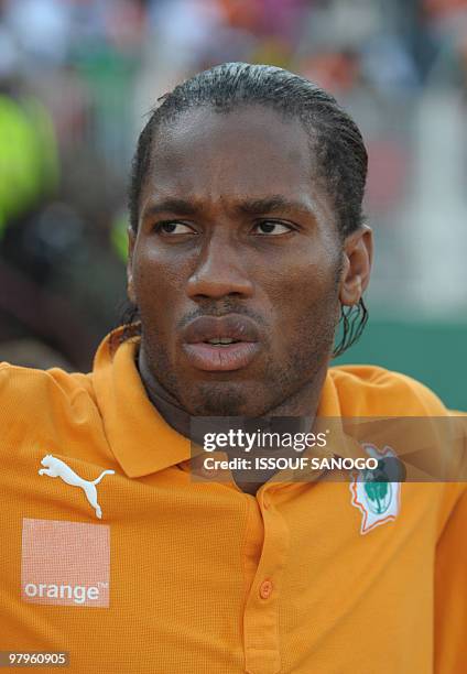 Ivory Coast's National footbal team player Didier Drogba poses on November 14, 2009 during a Fifa 2010 World Cup match against Guinea at the Felix...