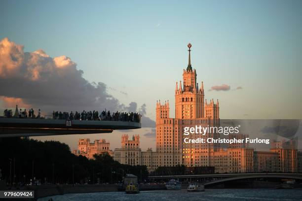 People view the Stalinist Kotelnicheskaya Embankment Building from an obervation platform over the Moscow River on June 20, 2018 in Moscow, Russia....