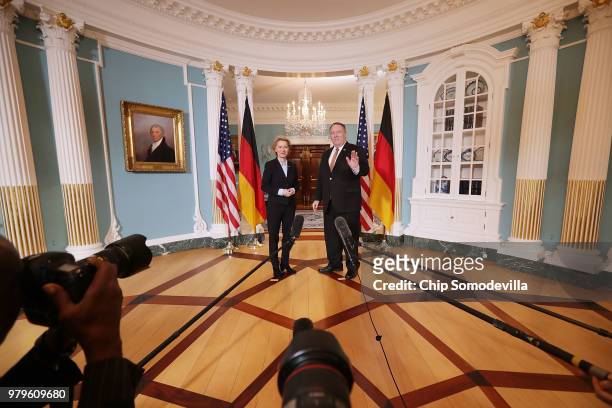 German Defense Minister Ursula von der Leyen and U.S. Secretary of State Mike Pompeo pose for photographs before meeting in the Treaty Room at the...