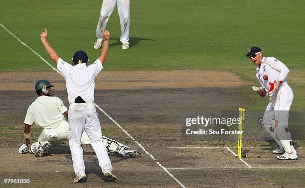 England wicketkeeper Matt Prior celebrates after Graeme Swann had taken the wicket of Bangladesh batsman Jahurul Islam during day four of the 2nd...