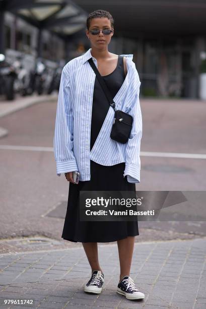 Guest poses after the Acne Studios show during Paris Fashion Week Menswear SS19 on June 20, 2018 in Paris, France. (Photo by Vanni Bassetti/Getty...