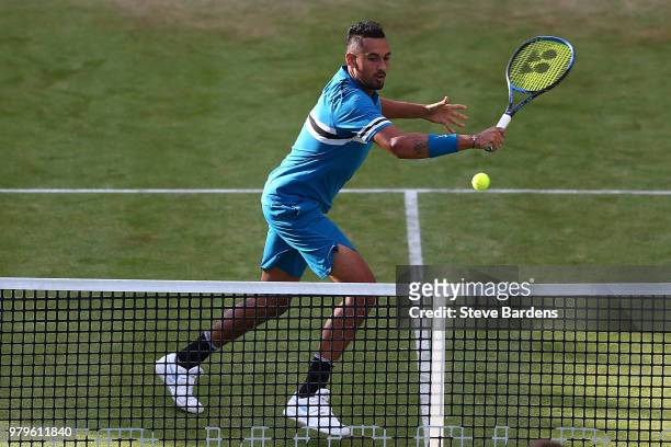 Nick Kyrgios plays a backhand during his doubles match against Pierre-Hughes Herbert and Nicolas Mahut of France on Day Three of the Fever-Tree...