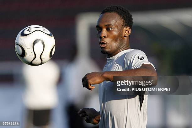 Ghanaian midfielder Michael Essien practices with the ball during a training session at Kickers stadium in Wurzburg 13 June, 2006. Ghana play Czech...