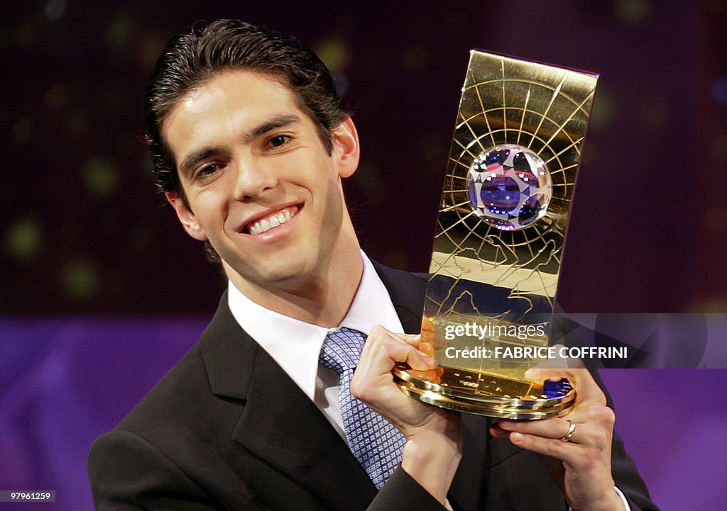 Brazil's football player Kaka holds the
