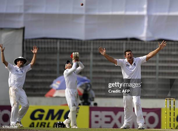 England cricketers Tim Bresnan and Graeme Swann join teammate Matt Prior as they appeal unsuccessfully for the dismissal of unseen Bangladeshi...