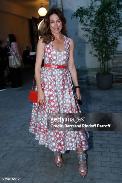 Actress Elsa Zylberstein, dressed in Azzedine Alaia, attends photographer Bruce Weber signs the book "Azzedine, Bruce and Joe" at Galerie Azzedine...