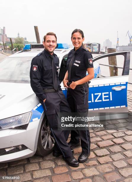 June 2018, Germany, Hamburg: Actors Marc Barthel playing Kristian Freiberg and Aybi Era playing Pinar Aslan pose at the photocall for the ZDF cop...