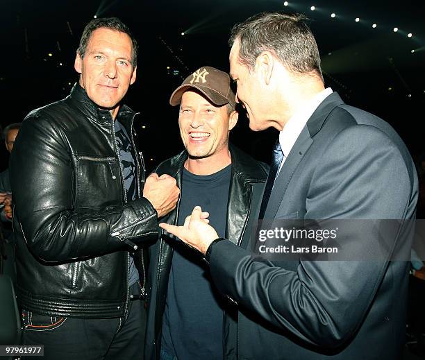 Ralf Moeller, Till Schweiger and Henry Maske are seen prior to the WBO Heavyweight World Championship fight between Wladimir Klitschko of Ukraine and...