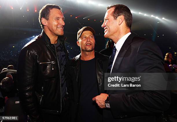 Ralf Moeller, Till Schweiger and Henry Maske are seen prior to the WBO Heavyweight World Championship fight between Wladimir Klitschko of Ukraine and...