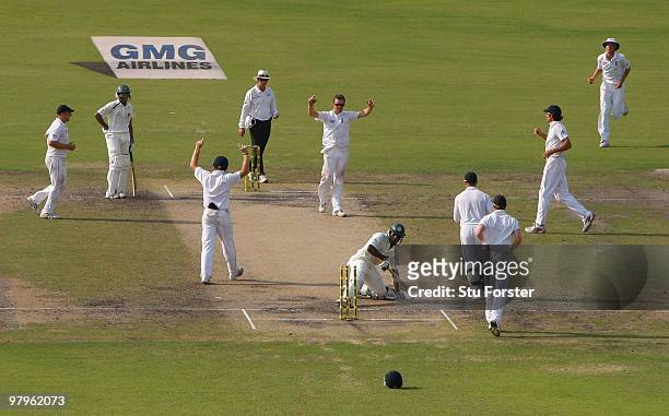 England bowler Graeme Swann and team mates celebrate the wicket of Bangladesh batsman Jahurul Islam during day four of the 2nd Test match between...