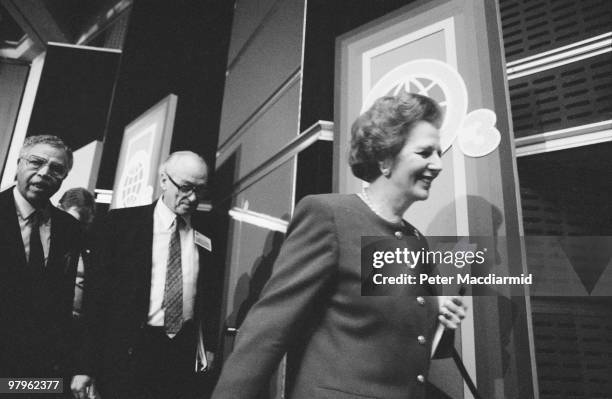 British Prime Minister Margaret Thatcher and her husband Denis attend the 'Saving the Ozone Layer' conference in the Queen Elizabeth II Conference...