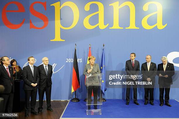 German Chancellor Angela Merkel makes a speech next to Spanish Prime Minister Jose Luis Rodriguez Zapatero and Spanish minister for Industry Tourism...