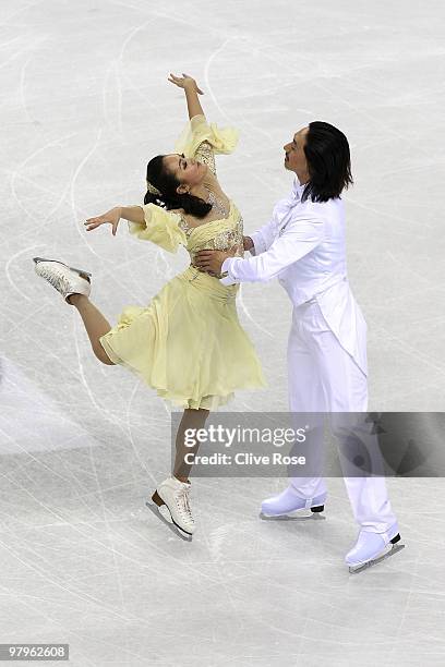 Xiaoyang Yu and Chen Wang of China compete in the Ice Dance Compulsory Dance during the 2010 ISU World Figure Skating Championships on March 23, 2010...