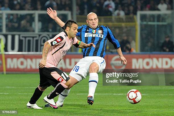 Fabrizio Miccoli of Palermo and Esteban Cambiasso of Internazionale Milano compete for the ball during the Serie A match between US Citta di Palermo...