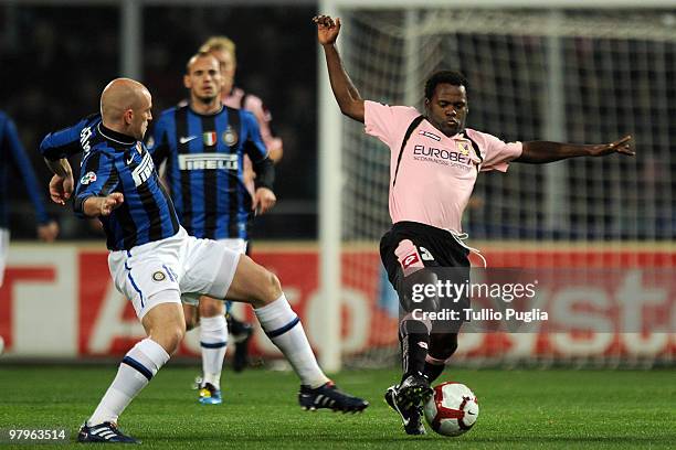 Esteban Cambiasso of Internazionale Milano and Fabio Simplicio of Palermo compete for the ball during the Serie A match between US Citta di Palermo...