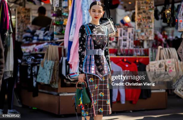 Sherry Shen is seen outside Off/White on day two of Paris Fashion Week Menswear SS19 on June 20, 2018 in Paris, France.