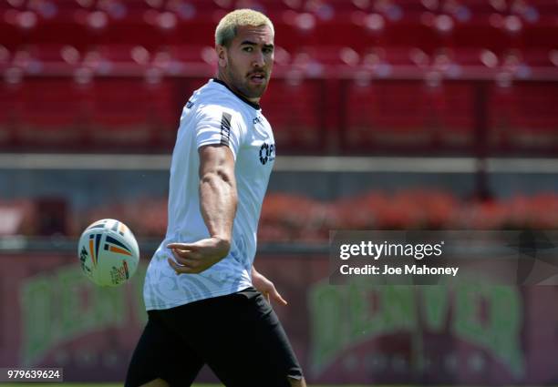 Nelson Asofa-Solomona of the New Zealand Kiwis rugby team flips the balll during a training session at University of Denver on June 20, 2018 in...