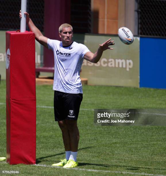 Nelson Asofa-Solomona, left, Leeson Ah Mauof the New Zealand Kiwis rugby team throws the ball during a training session at University of Denver on...